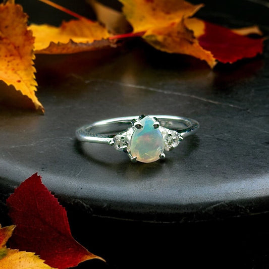 Ethiopian Opal & White Topaz Accent Ring